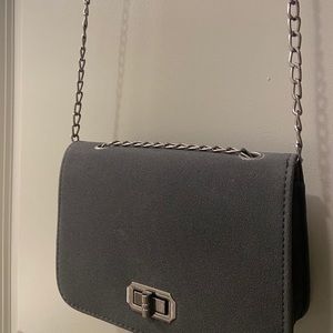 Mini black suede bag